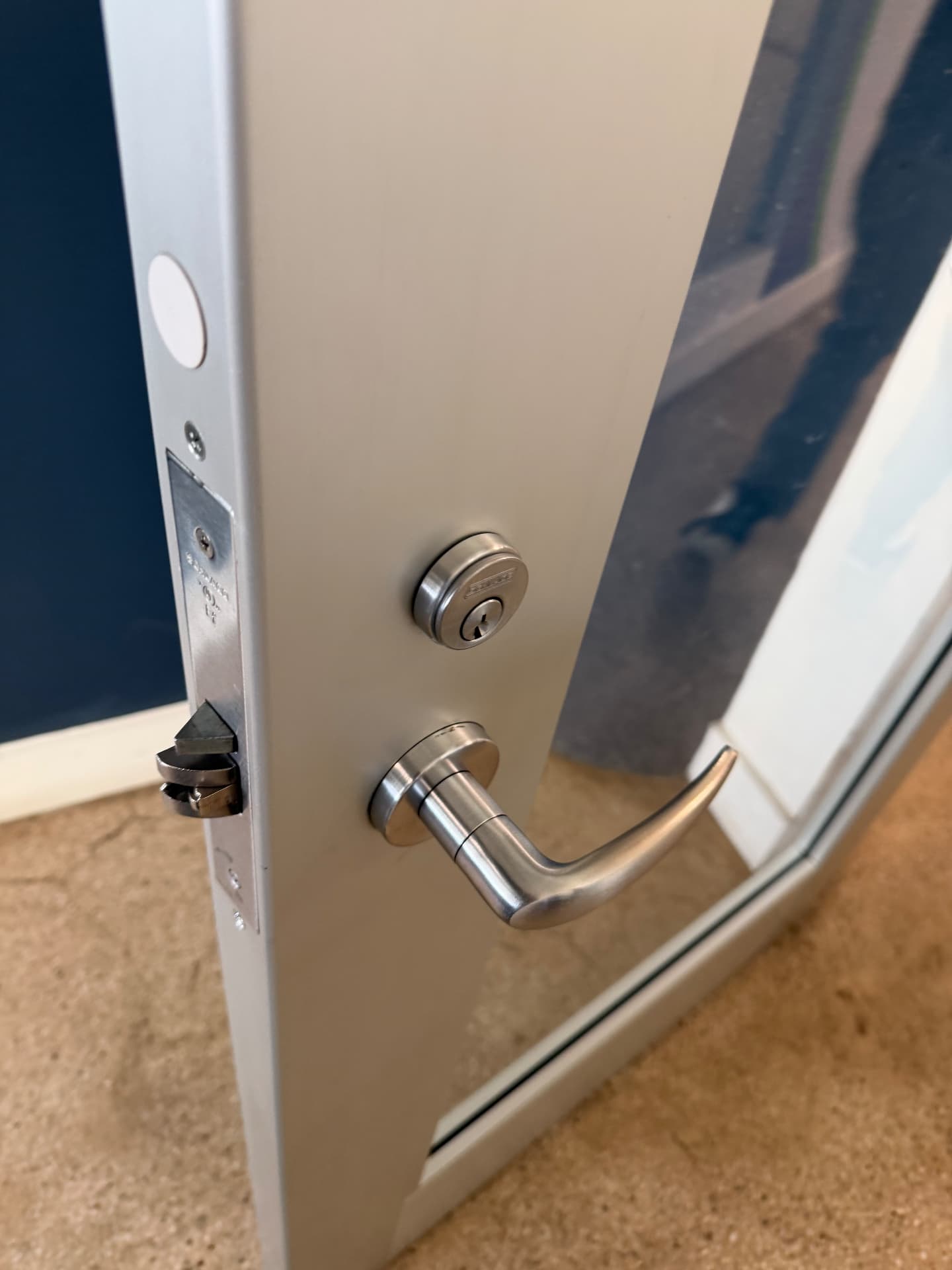 Commercial lever handle and deadbolt installed